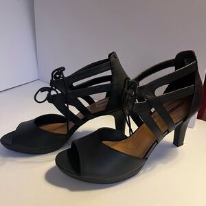 Elegant Black Heeled Sandals.